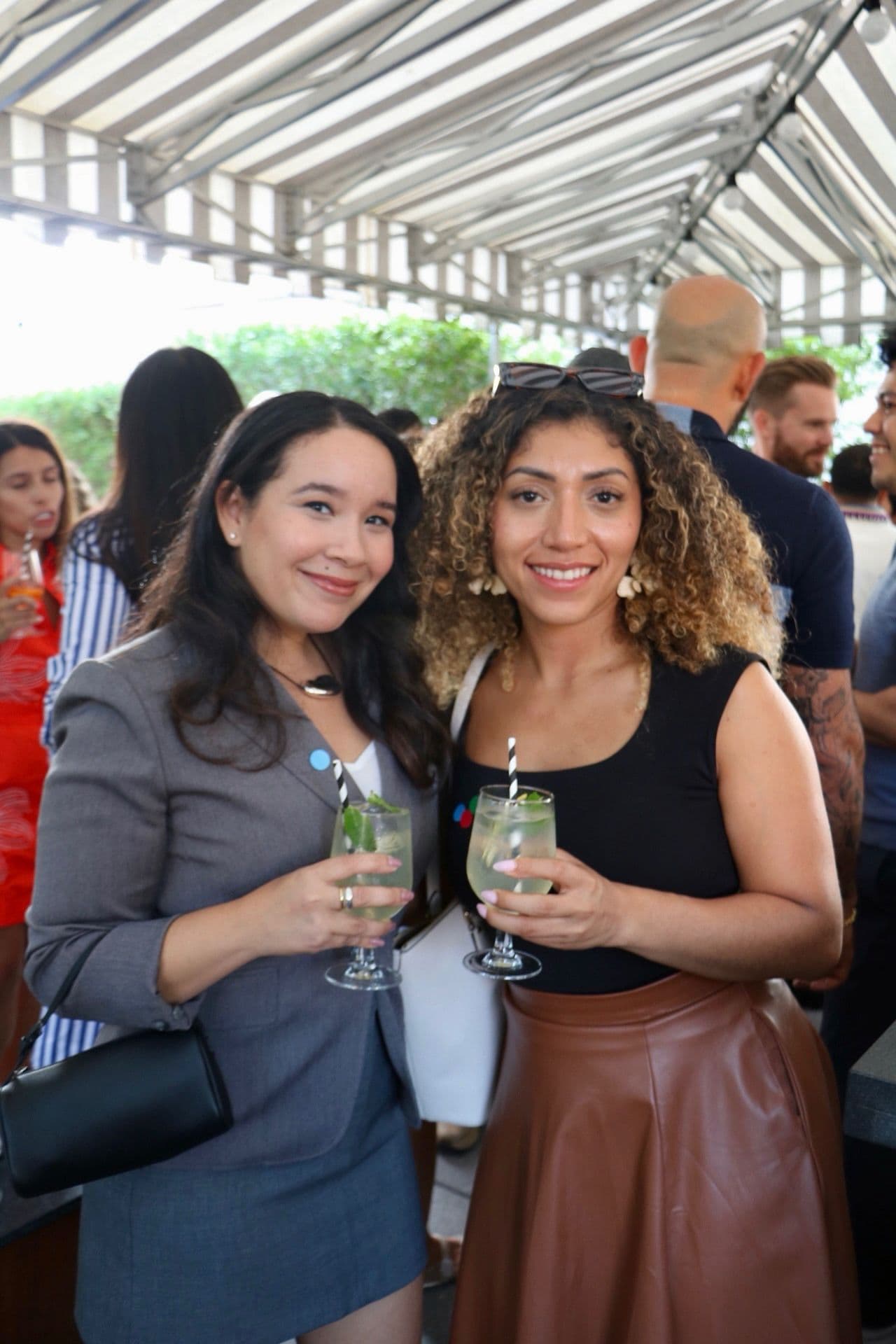ASCENSO professionals connecting at launch happy hour